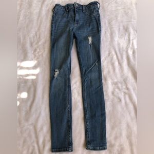 High waisted med-washed ripped jean leggings